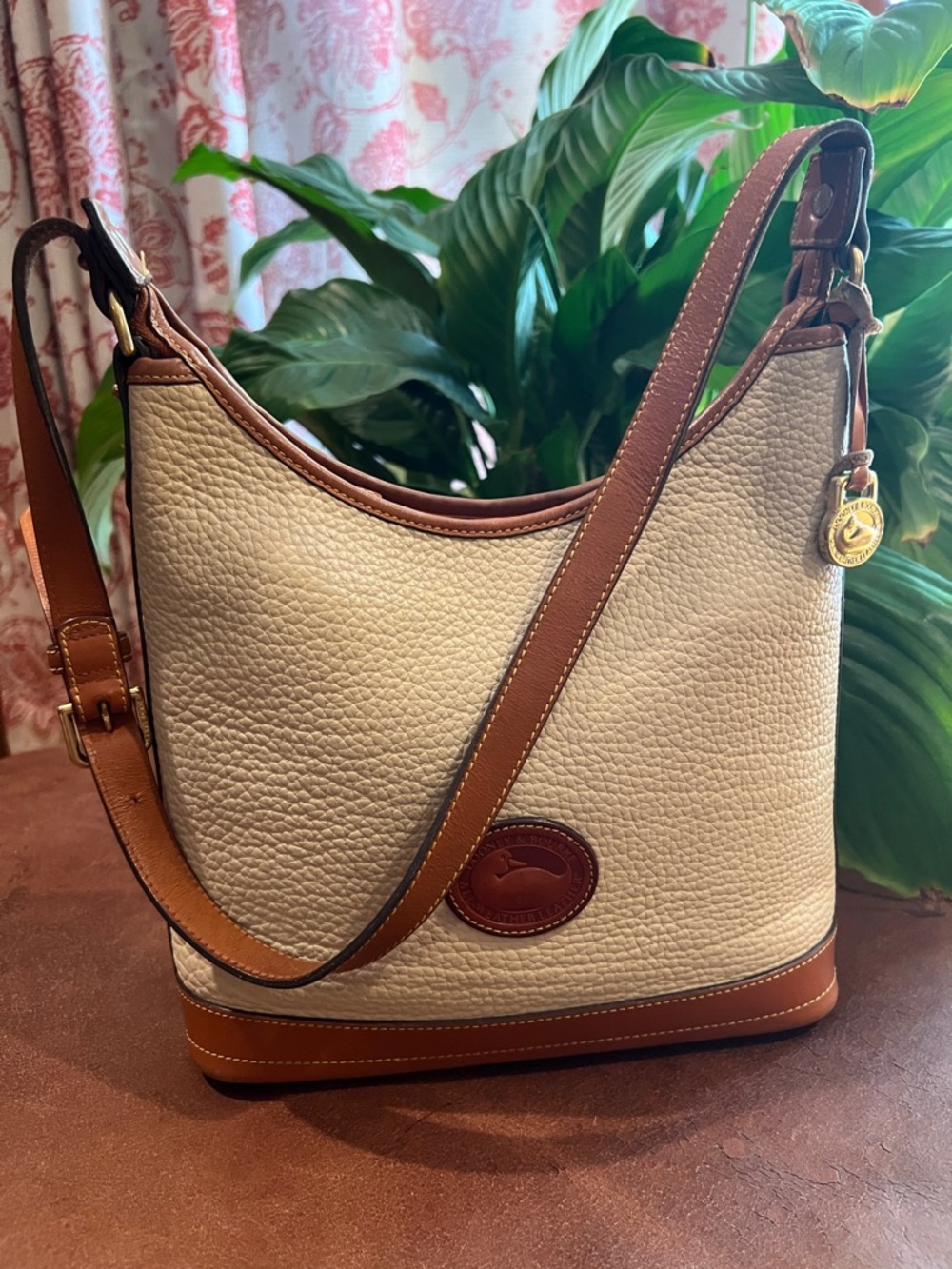 Dooney & Bourke Cream Pebbled Leather Shoulder Bag with Brown Trim